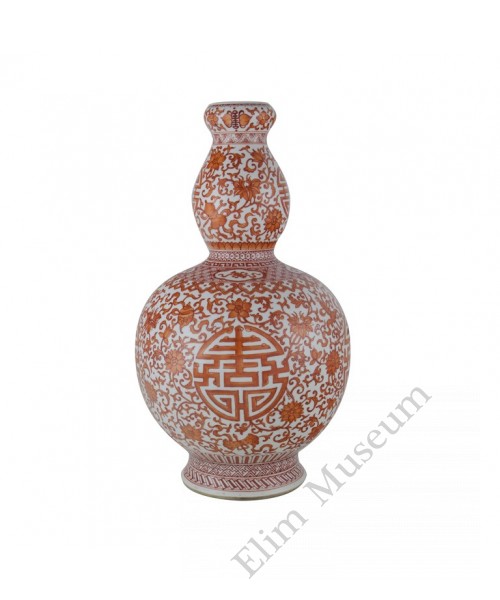 1120   A n  iron-red  gourd vase with blessing symbols 