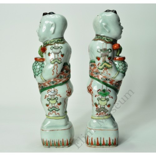 1136 A pair of Wucai painted lotus-boy  status 