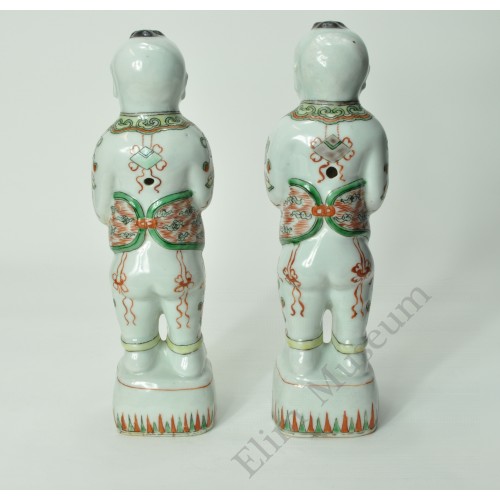 1136 A pair of Wucai painted lotus-boy  status 