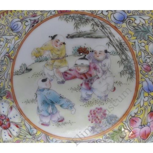 1143  A pair of Qian-long  fencai bowls with playing boys  