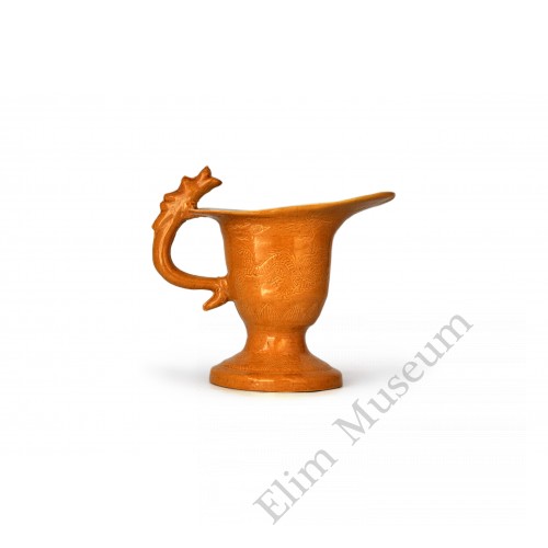 1553  An archaistic yellow glaze wine cup (Gong) 	