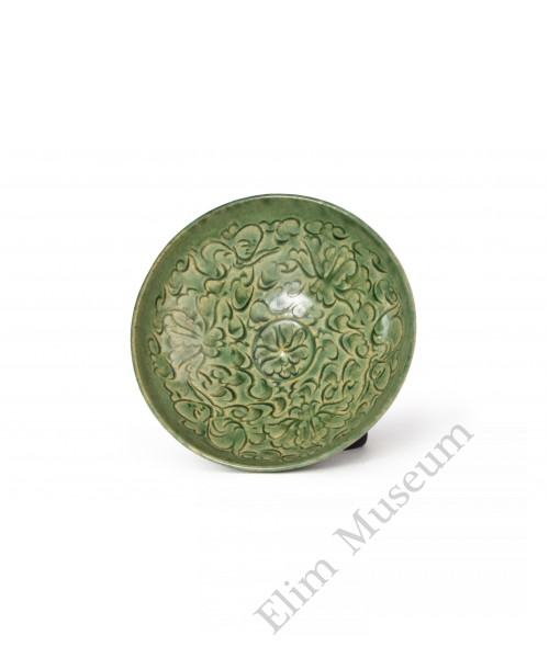 1618 A Jizhou-ware green glaze playing-babe bowl 