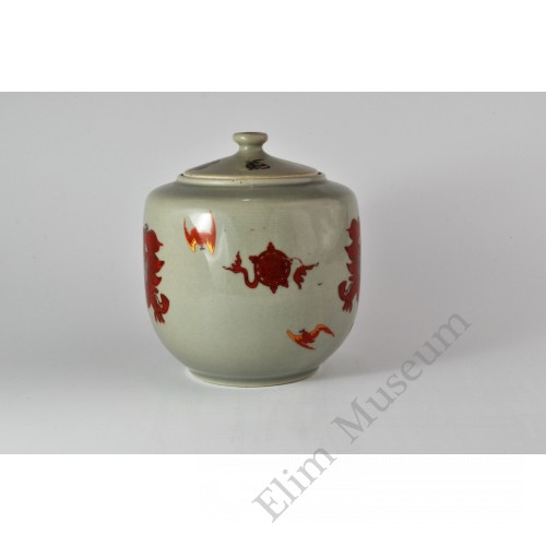 1654 A Iron-Red glaze lidded jar with auspicious lions   