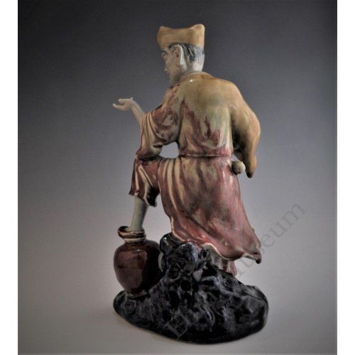 1657 An under glaze B&R statue of  the "drunken Monk"  