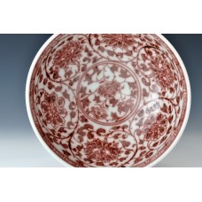1678 An under glaze red florist scrolls bowl  