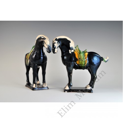 1684 A Pair of Molded and Sculpted Horse with Saddles  