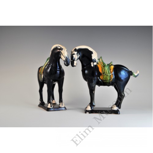 1684 A Pair of Molded and Sculpted Horse with Saddles  