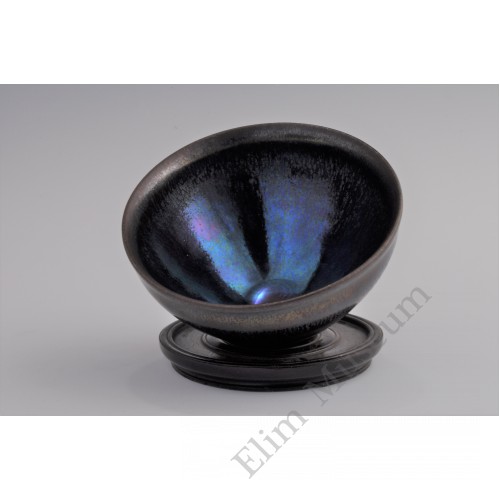 1699  A Jian stone-ware iridescent black glaze conical tea bowl  