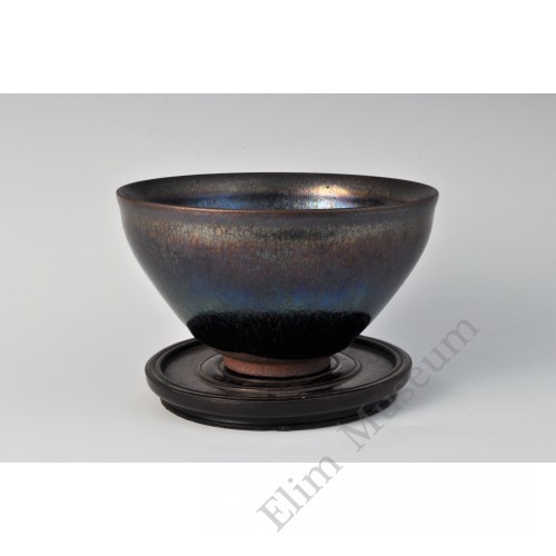 1699  A Jian stone-ware iridescent black glaze conical tea bowl  