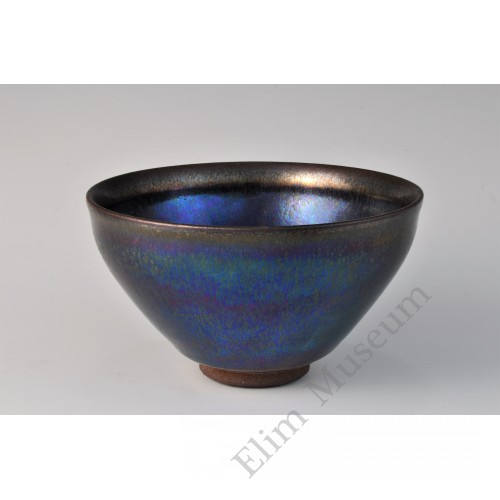 1699  A Jian stone-ware iridescent black glaze conical tea bowl  