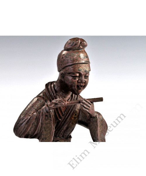 1725 A greem glazed sculpted earthenware musician 