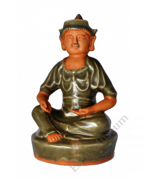 1728 A Longquan ware seated Mongol warrior