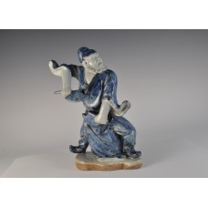 1743 A sculpted undergrlaze blue figure      