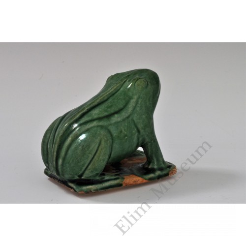 1745 A molded and sculpted green glaze frog   