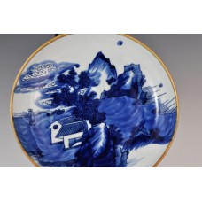 1751 An underglaze blue plate landscape decorated      