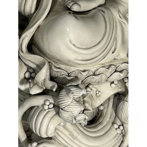 1799 Dehua white porcelain Guanyin sculpture by He Chaozong