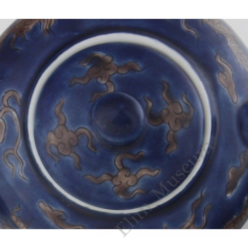 1196  A Kang-Xi sapphire blue engraved teapot 