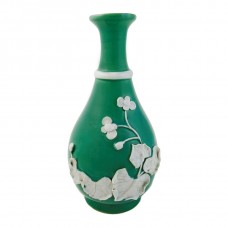 1048  A green glaze Yuhuchun vase with molded lotus