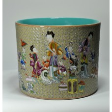 1058 A yangcai brush pot with the Four Consorts and Sixteen Sons motif